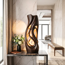 Flowing Hollow Wood Table Lamp with Warm Ambient Glow