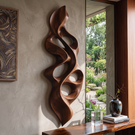 Wall Sculpture Vertical Flame with Organic Carved Openings