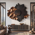 Wall Sculpture with Radiating Black Sun and Flowing Organic Wave Design