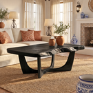 Solid Wood Coffee Table with Natural Edge Detail and Sculptural Base
