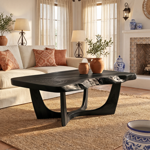 Solid Wood Coffee Table with Natural Edge Detail and Sculptural Base